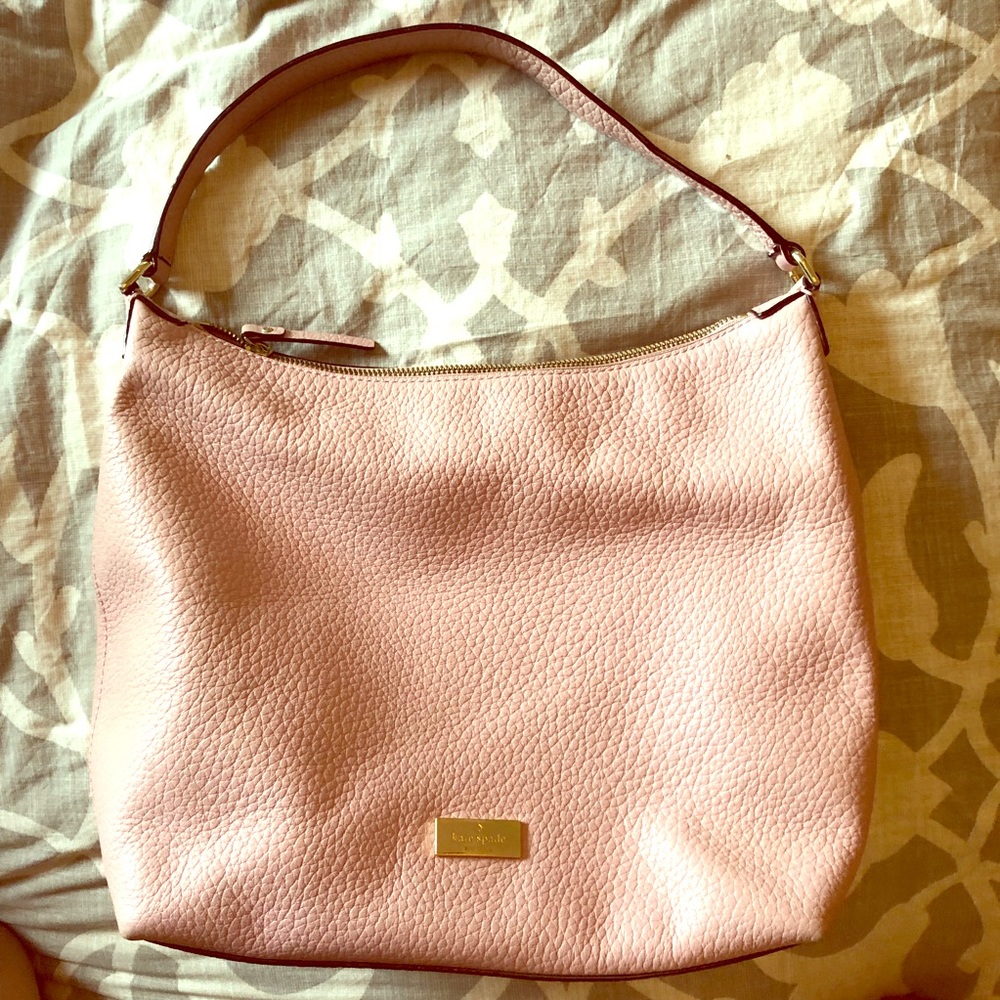 Pink Kate Spade over-shoulder purse
